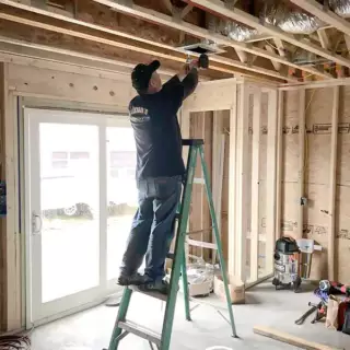  Installing ductwork and vents in a newly constructed home